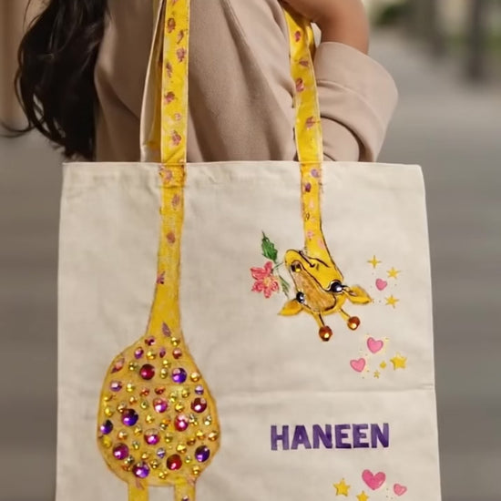 girl holding canvas tote bag